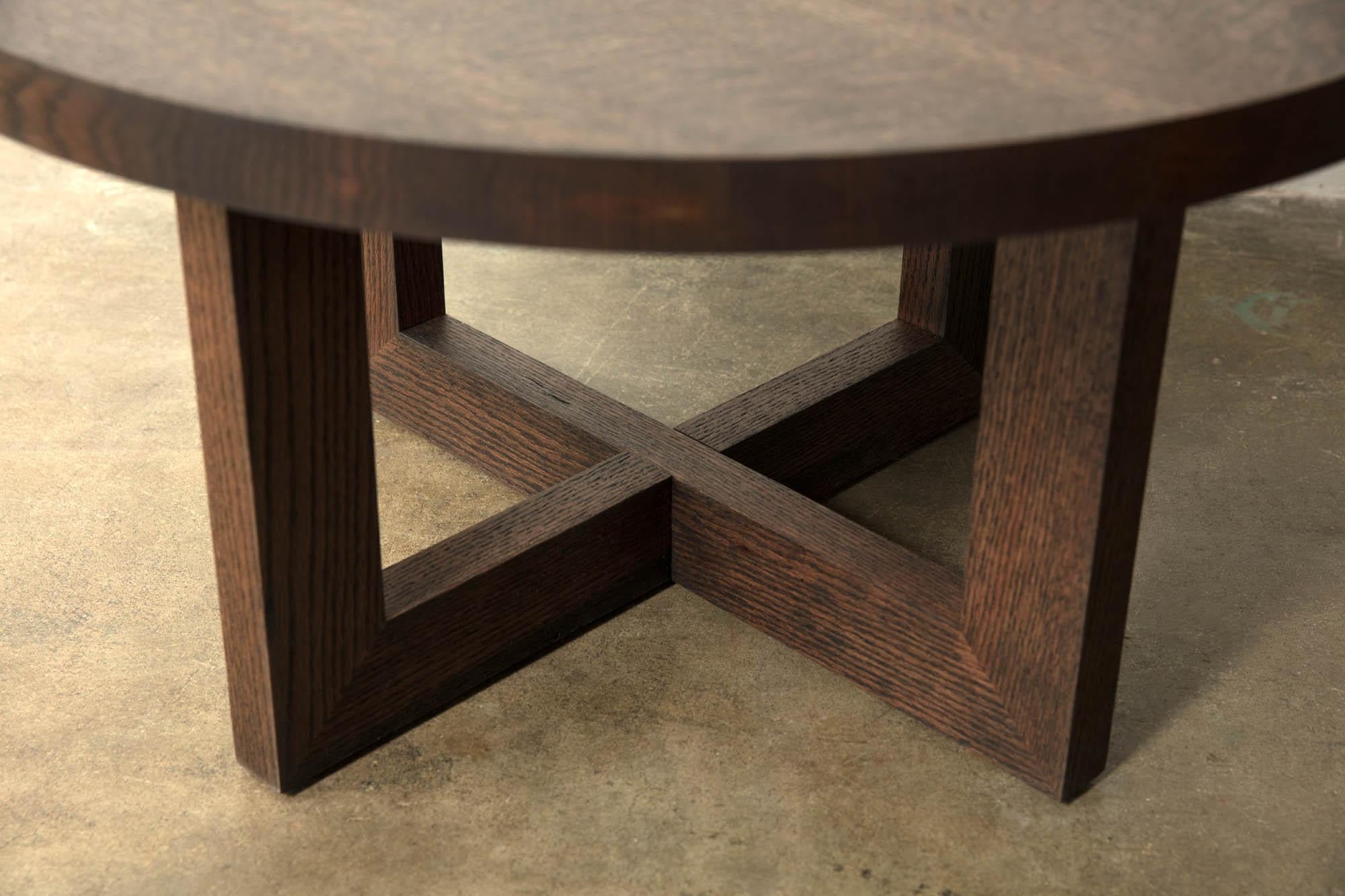 Solid wood from the urban forest imbues this Round Wood Coffee Table in Darkened Urban Oak with a unique grain and texture. The dark walnut color gives a defined, modern silhouette. This piece works for a residential living room or sitting room, as
