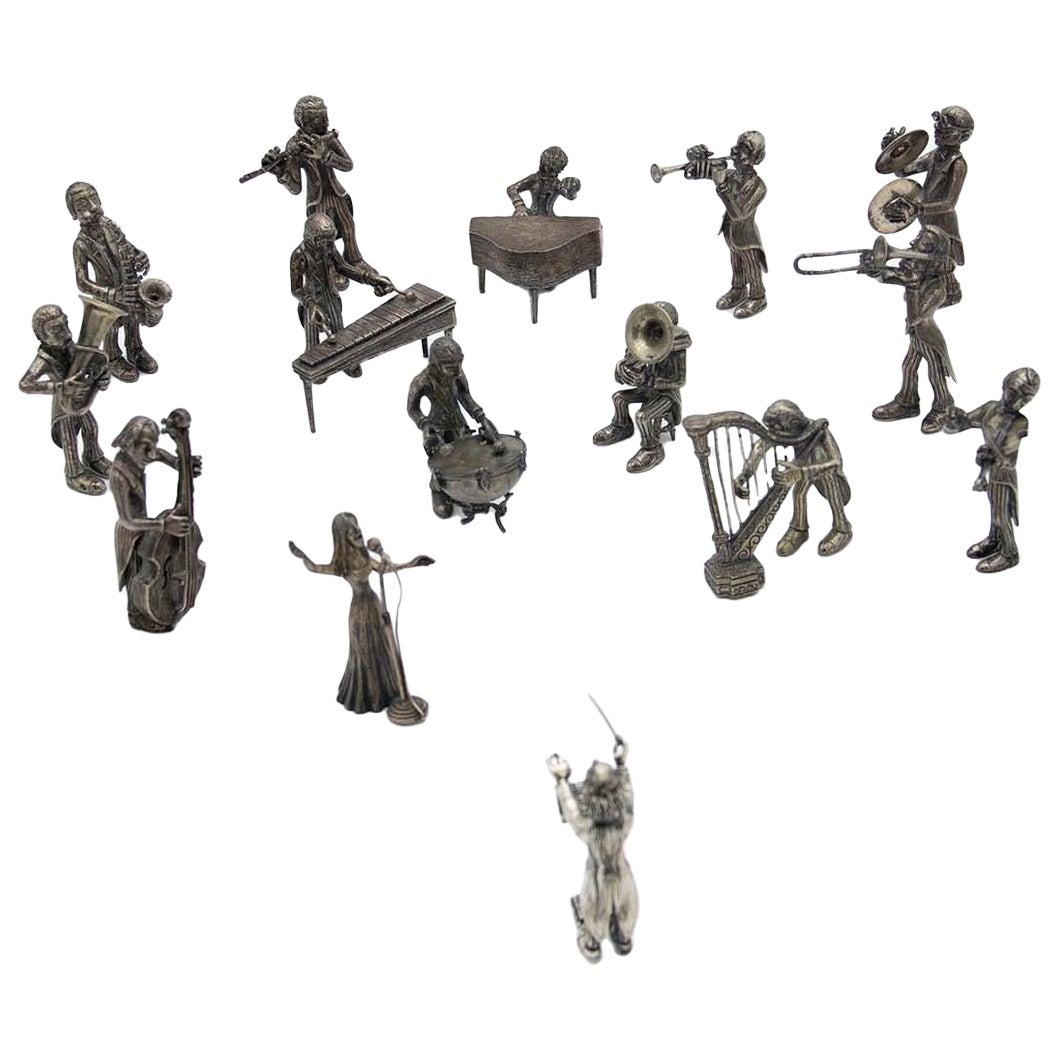 Orchestra of (15) musicians in silver with conductor