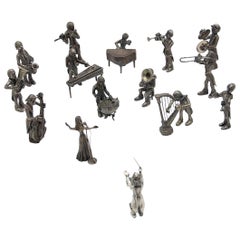 Orchestra of (15) musicians in silver with conductor