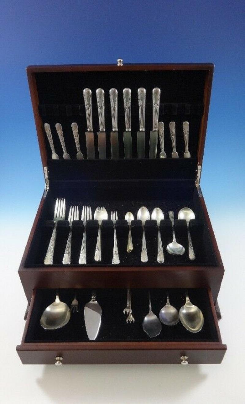 Orchid by International sterling silver flatware set of 61 pieces. This set includes:

6 knives, 8 3/4