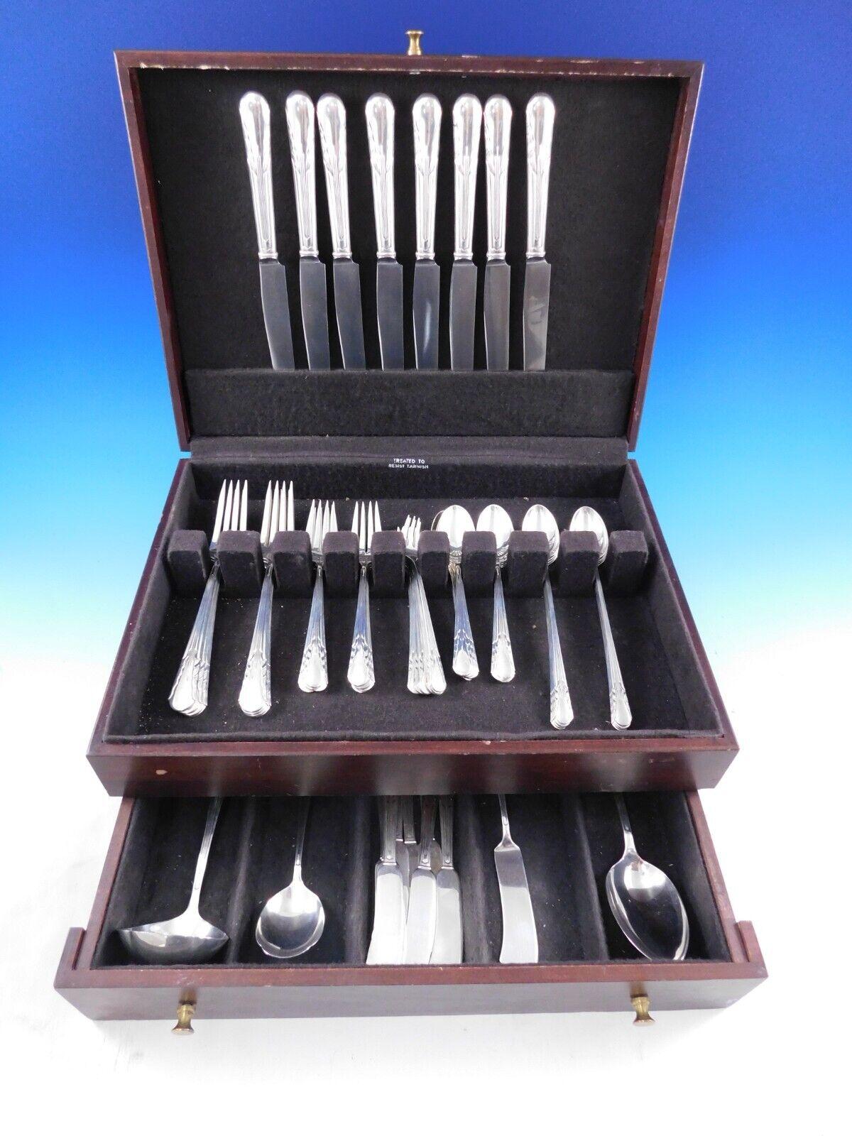 Dinner Size Orchid by International sterling silver flatware set, 68 pieces. This set includes:

8 Dinner Size Knives, 9 1/2
