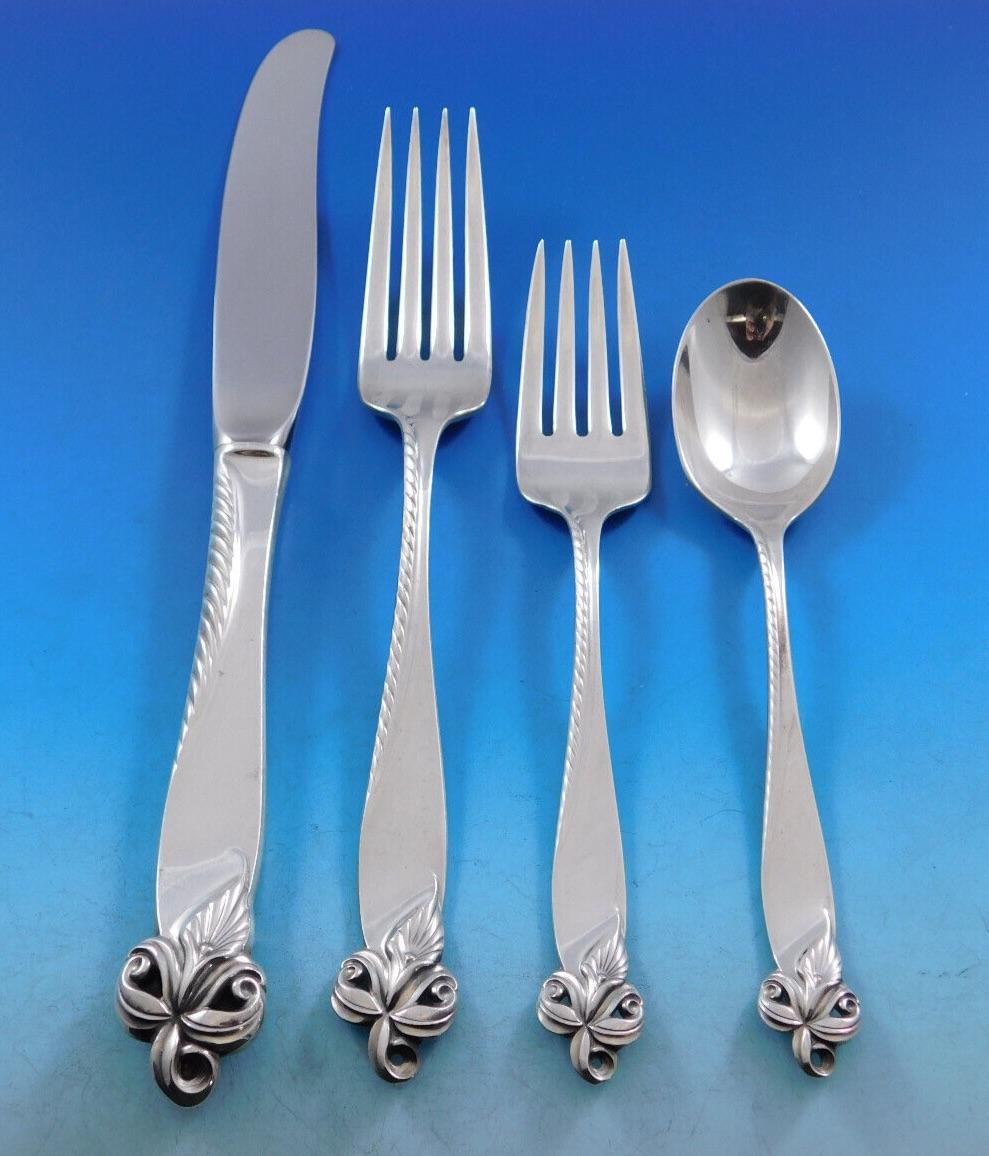 Gorgeous dinner size orchid elegance by Wallace sterling silver flatware set, 72 pieces. This set includes:

12 Dinner size Knives, 9 3/4