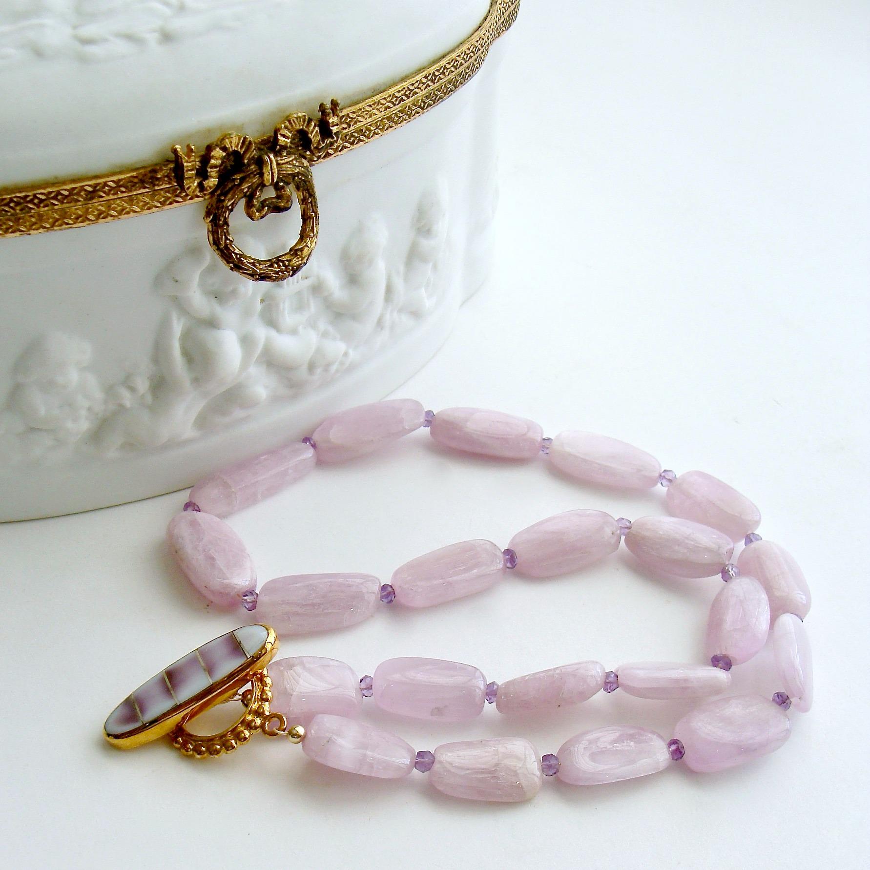 Orianne V Necklace

A stunning suite of smooth flat kunzite nuggets in a sweet orchid confectionery color, create a modern and feminine choker necklace.  The untamed nature of these gorgeous confectionery colored stones is a sophisticated