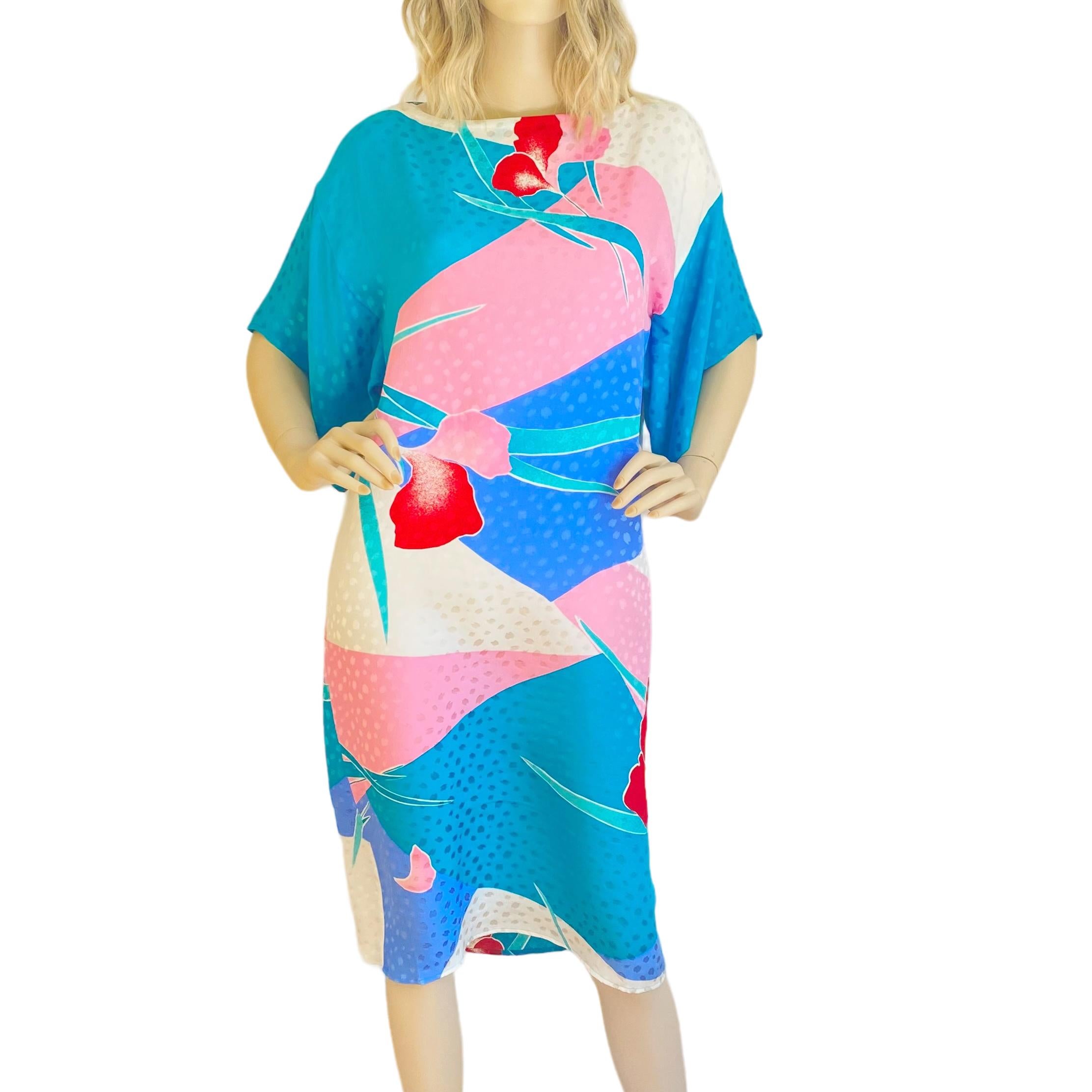 Never used. Fresh from FLORA KUNG design library archive.
Name: Flora Kung Orchid dress.
Fabric: 100% silk petal jacquard.
Print: Turquoise, pink, blue orchid on white
Circa: 1984
Condition: New with tag
 *Dress only. Elsa Peretti for Halston