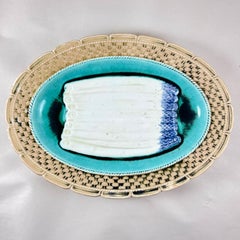 Orchies, piatto da portata in maiolica francese Faïence con asparagi