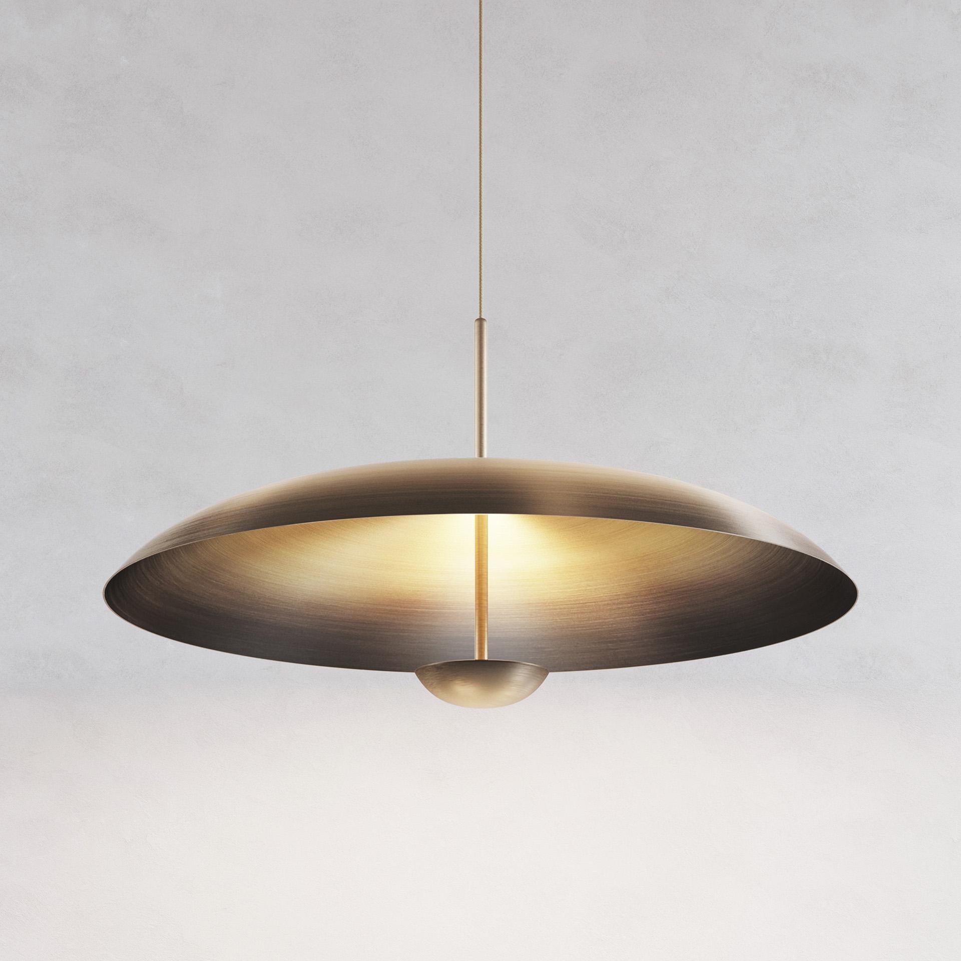 Ore Pendant 100 by Atelier001
Dimensions: D100 x H52 cm
Materials: shade Bronze gradient patinated brass
Framework satin brass
Also available: in different dimension and finishes. 

All our lamps can be wired according to each country. If sold to