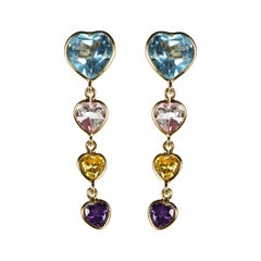 degrade heart earrings with various 18k gold gemstones