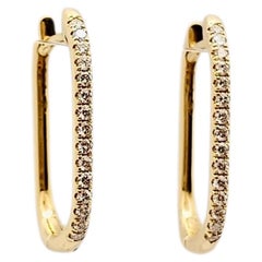 Pendientes elípticos de oro amarillo de 18 quilates y diamantes de 0,32 quilates