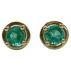 18Kt gold and emeralds lobe earrings Made in italy
