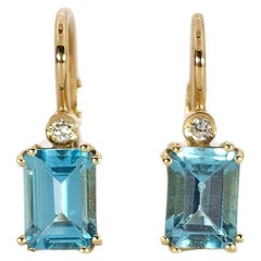 Boucles d'oreilles nonne en or 18 carats avec topaze et diamant