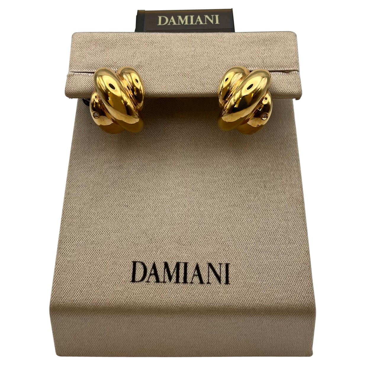 Orecchini Damiani gomitolo in oro 18 kt. con diamanti - Iconico design italiano in vendita
