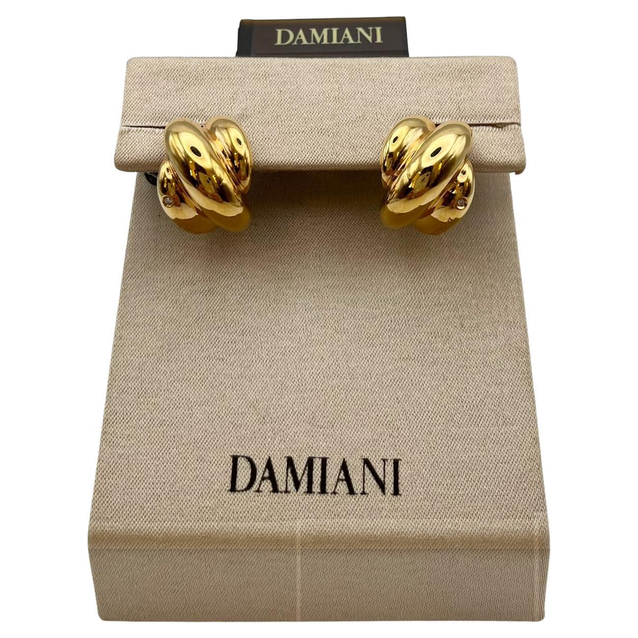 Orecchini Damiani gomitolo in oro 18 kt. con diamanti - Iconico design italiano
