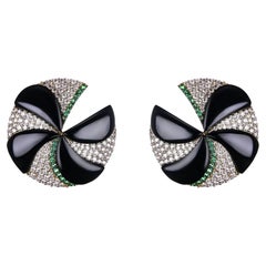 Handmade 18-karat gold earrings with onyx, diamonds, and emeralds