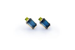 Handmade 18-karat gold earrings with peridots, London Blue topazes, and diamonds