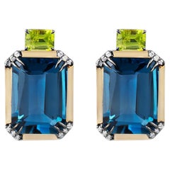 Handmade 18-karat gold earrings with peridots, London Blue topazes, and diamonds