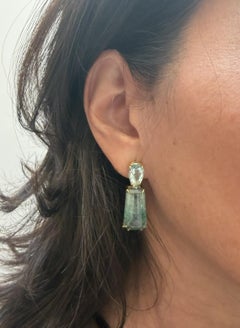 Handmade 18-karat gold earrings with trapezoidal tourmalines and blue beryls