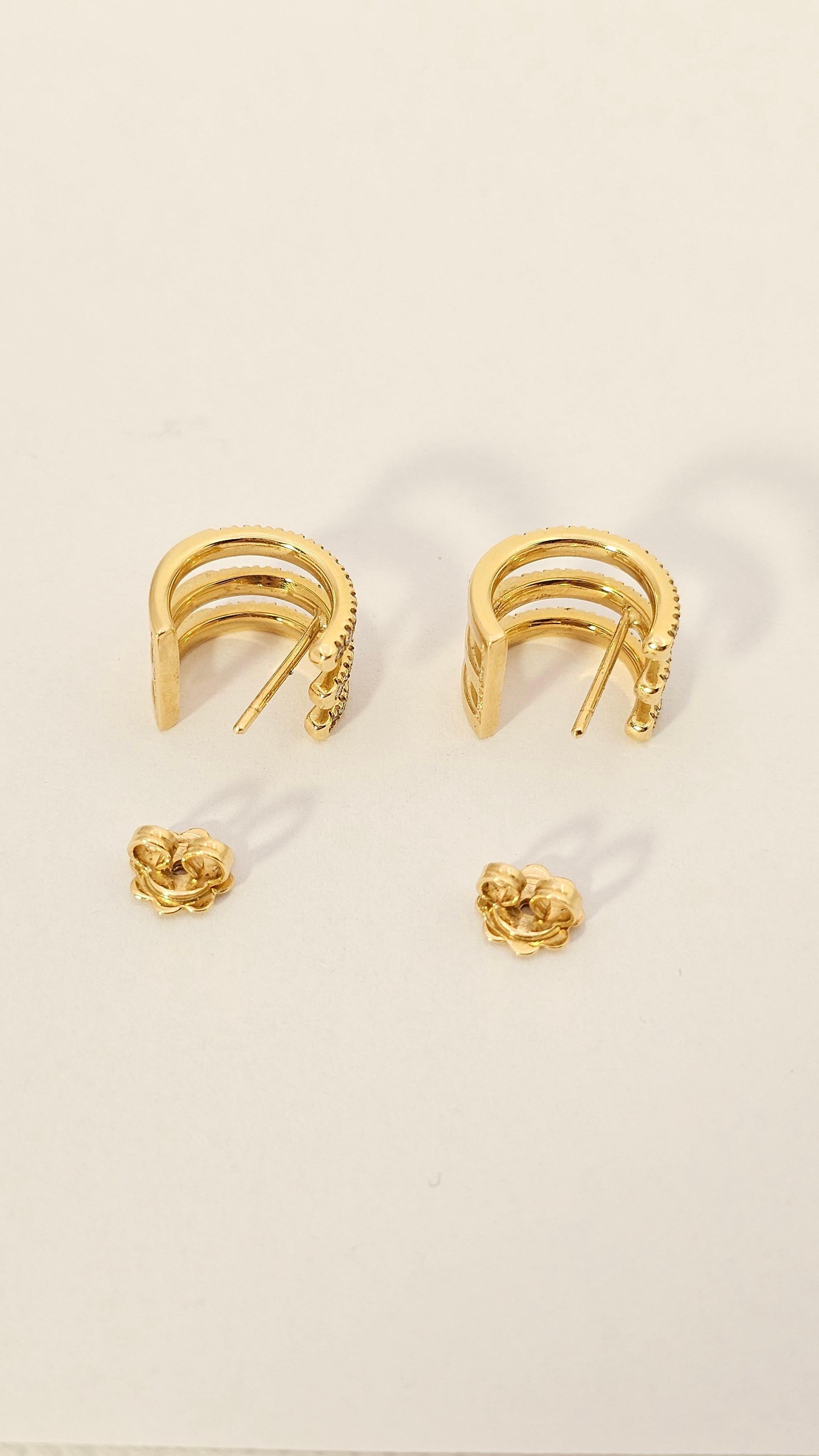Boucles d'oreilles  Cercles géométriques en or jaune et diamants Unisexe en vente