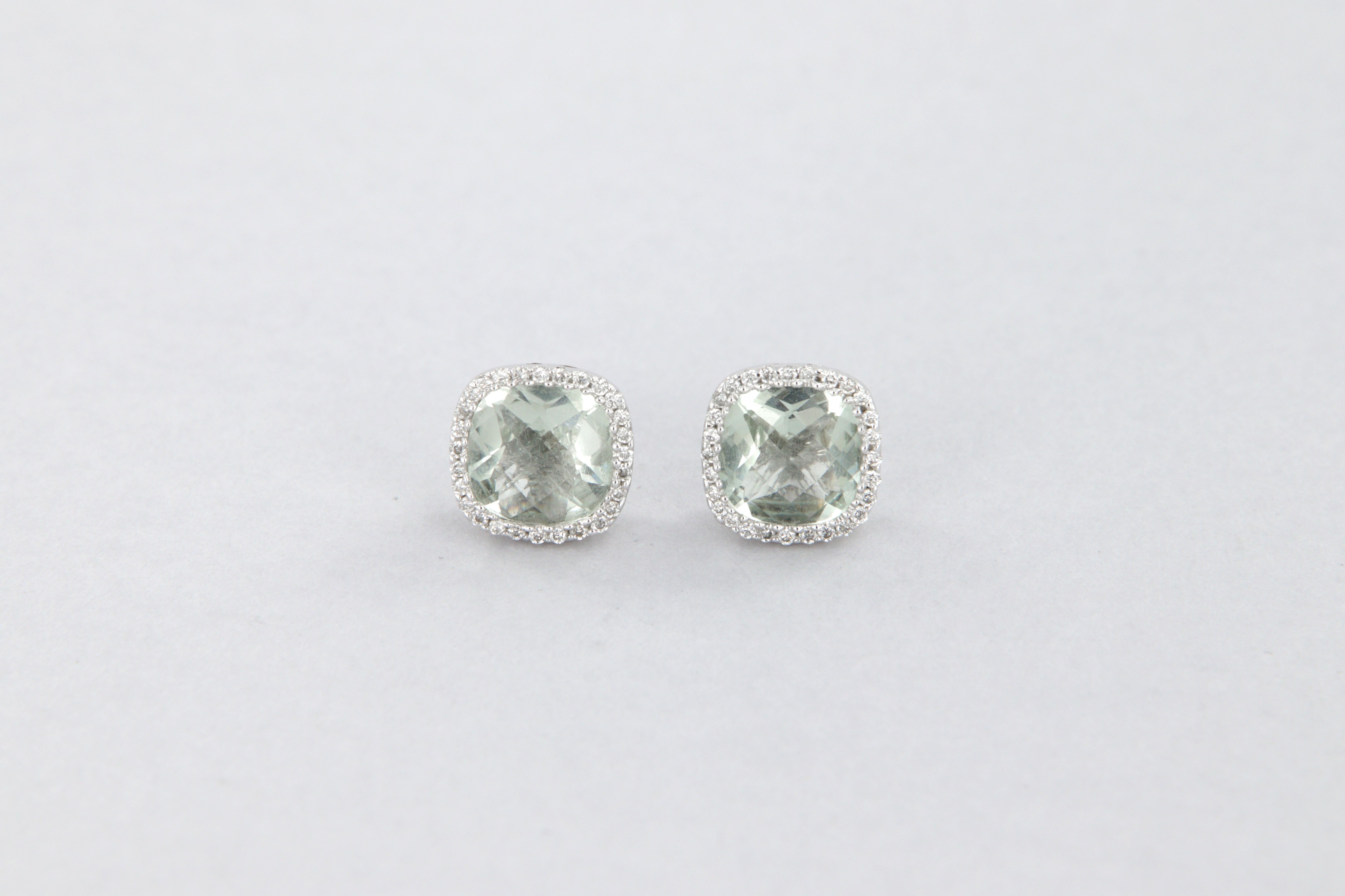 18k white gold lobe halo earrings, weight g 2.9, with very light green cushion-cut rose coronet quartz,  carat weight 2.22 decorated by contour in  round brilliant-cut diamonds, carat weight 0.19, clarity VS, color G-H.

Delightful fretwork of
