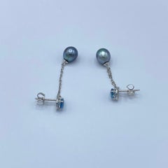 18Kt white gold earrings with aquamarine drops and South Sea pearls