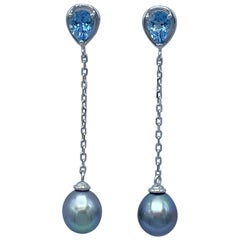 18Kt white gold earrings with aquamarine drops and South Sea pearls 18Kt white gold earrings with aquamarine drops and South Sea pearls
