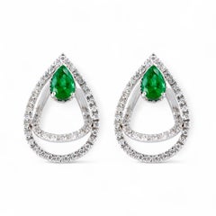 18kt white gold, clip-on drop shape earrings with Diamonds and Emeralds