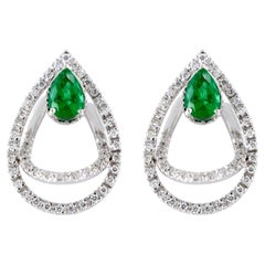 18kt white gold, clip-on drop shape earrings with Diamonds and Emeralds