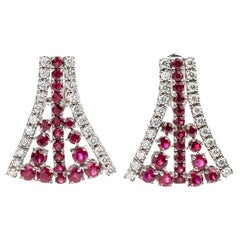 Gold earrings with rubies and diamonds