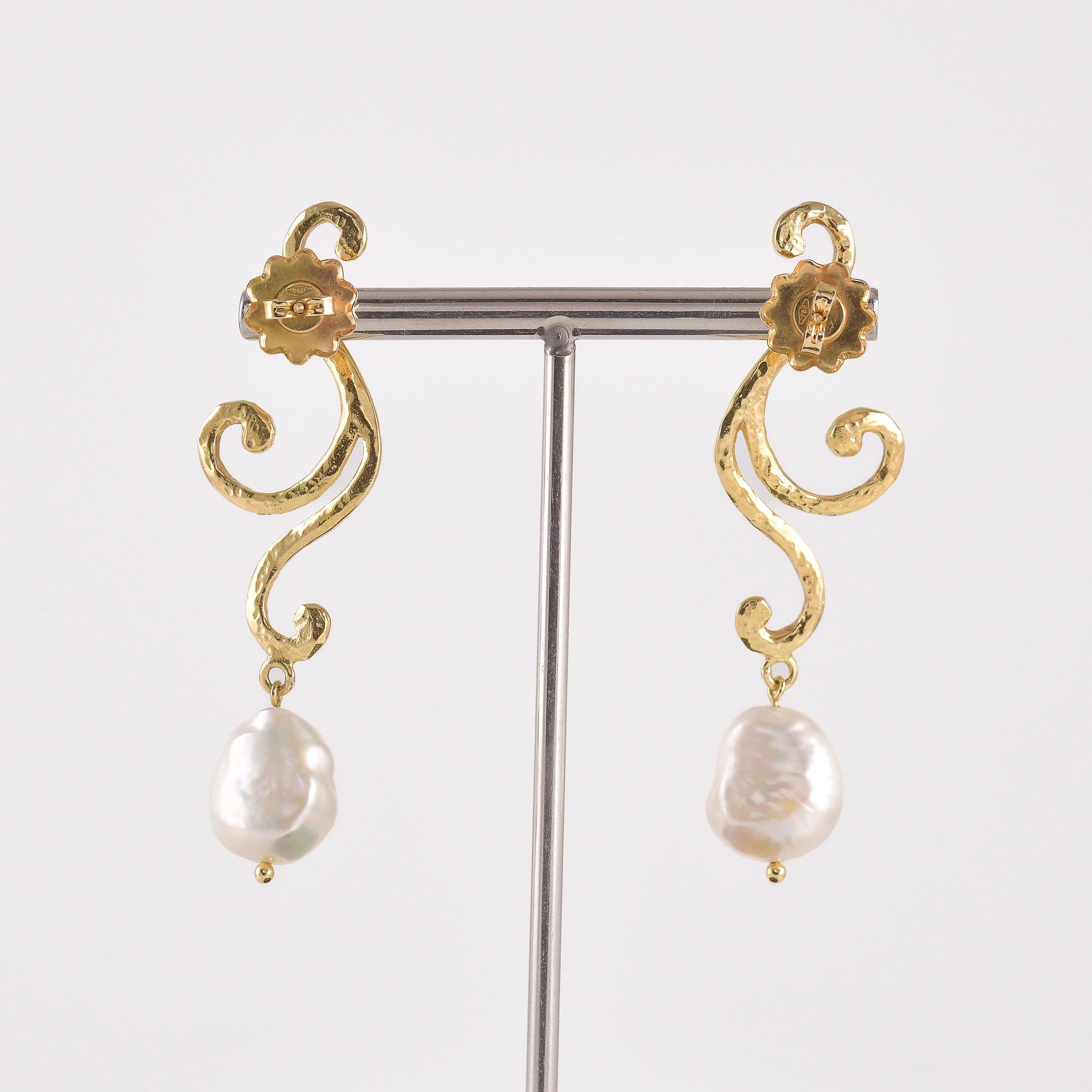 GEMOLOGICAL ANALYSIS
Pair of 18k yellow gold earrings - 750/1000 marked 