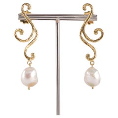 Boucles d'oreilles arabesques en or jaune avec perles de culture