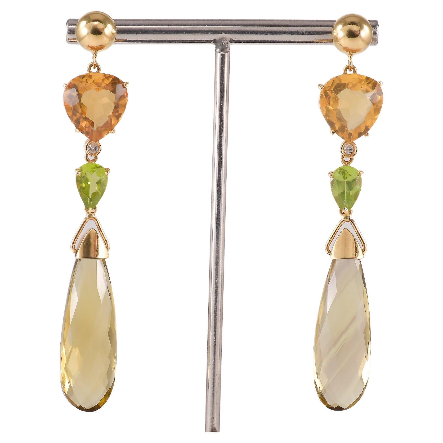 Yellow gold earrings with citrine quartz diamonds and peridots