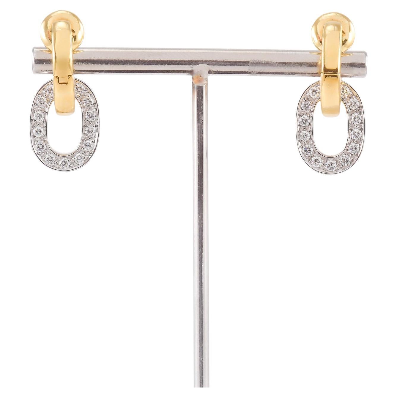 Boucles d
oreilles en or jaune et diamants signées POMELLATO