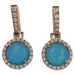 Orecchini in oro rosso con diamanti e triplette double-face