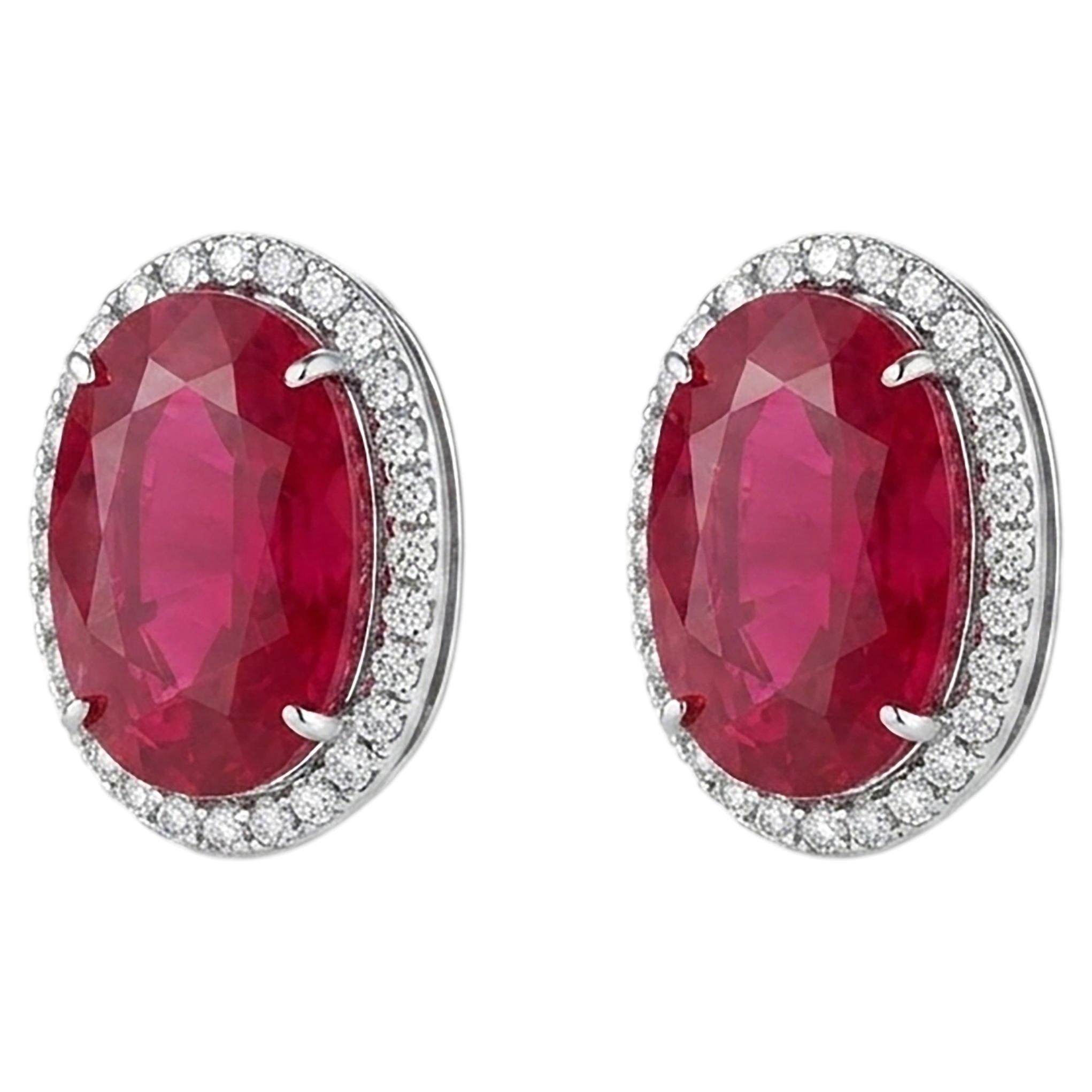 Modern, handmade earrings in 18-karat white gold with rubies and diamonds