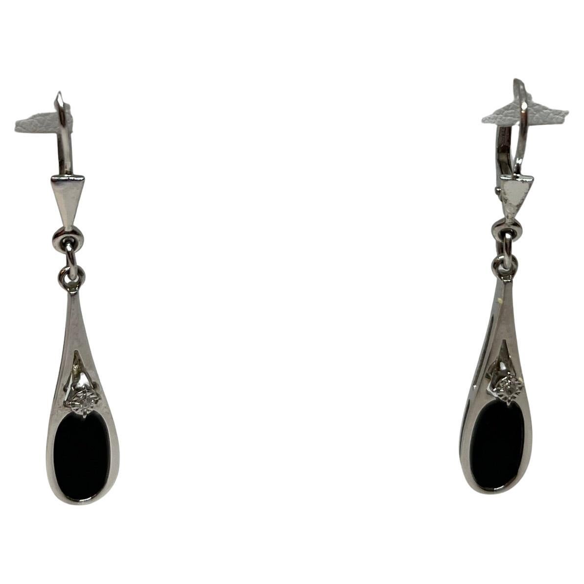 Vintage 9 kt white gold earrings with onyx and diamond