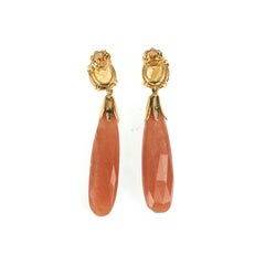 boucles d'oreilles en or 18k saphir jaune facetté et opale orange