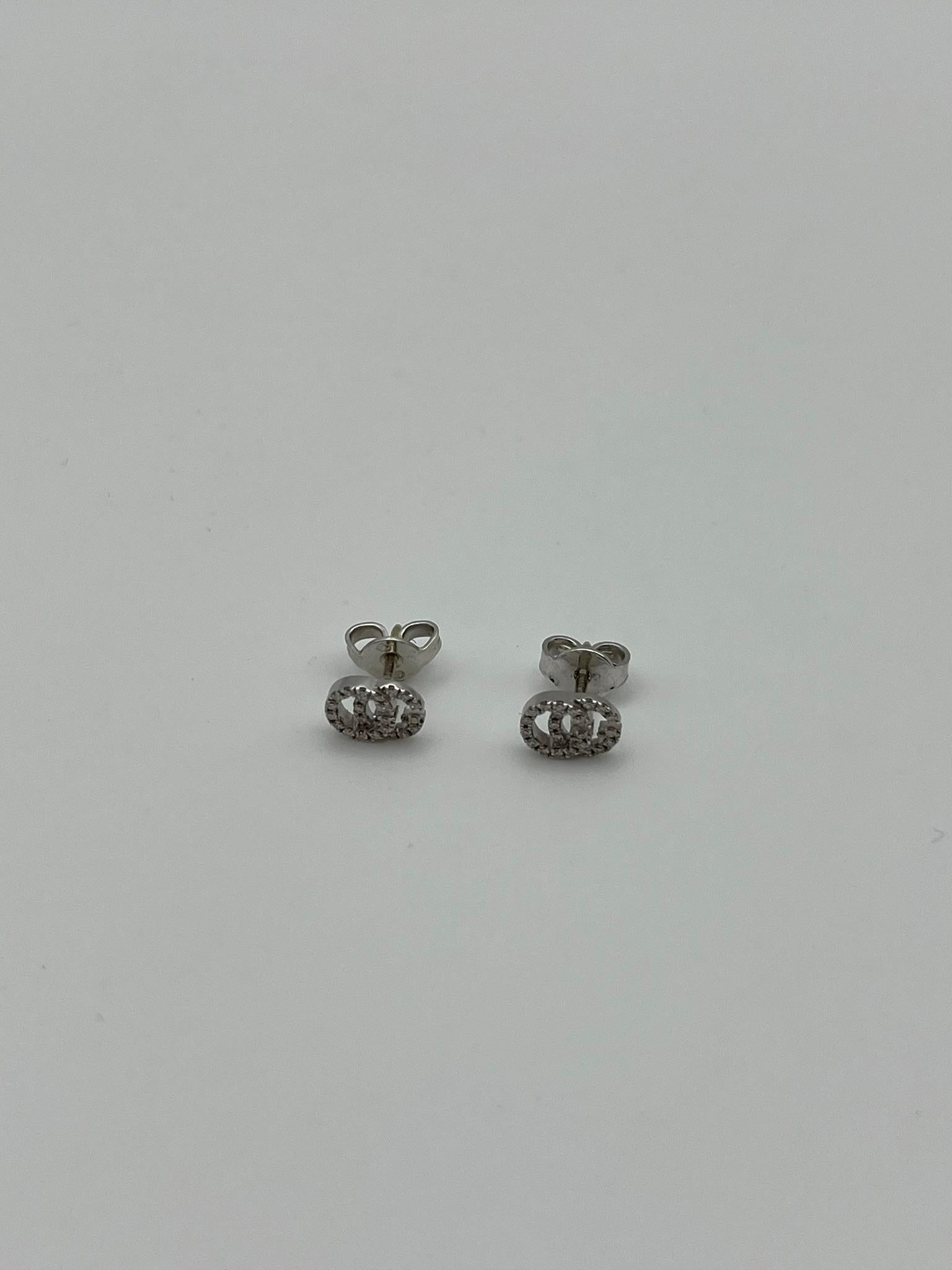 Orecchni Gucci Running G in oro bianco 18 kt. e diamanti In condizioni Nuovo in vendita a Abano Terme, IT