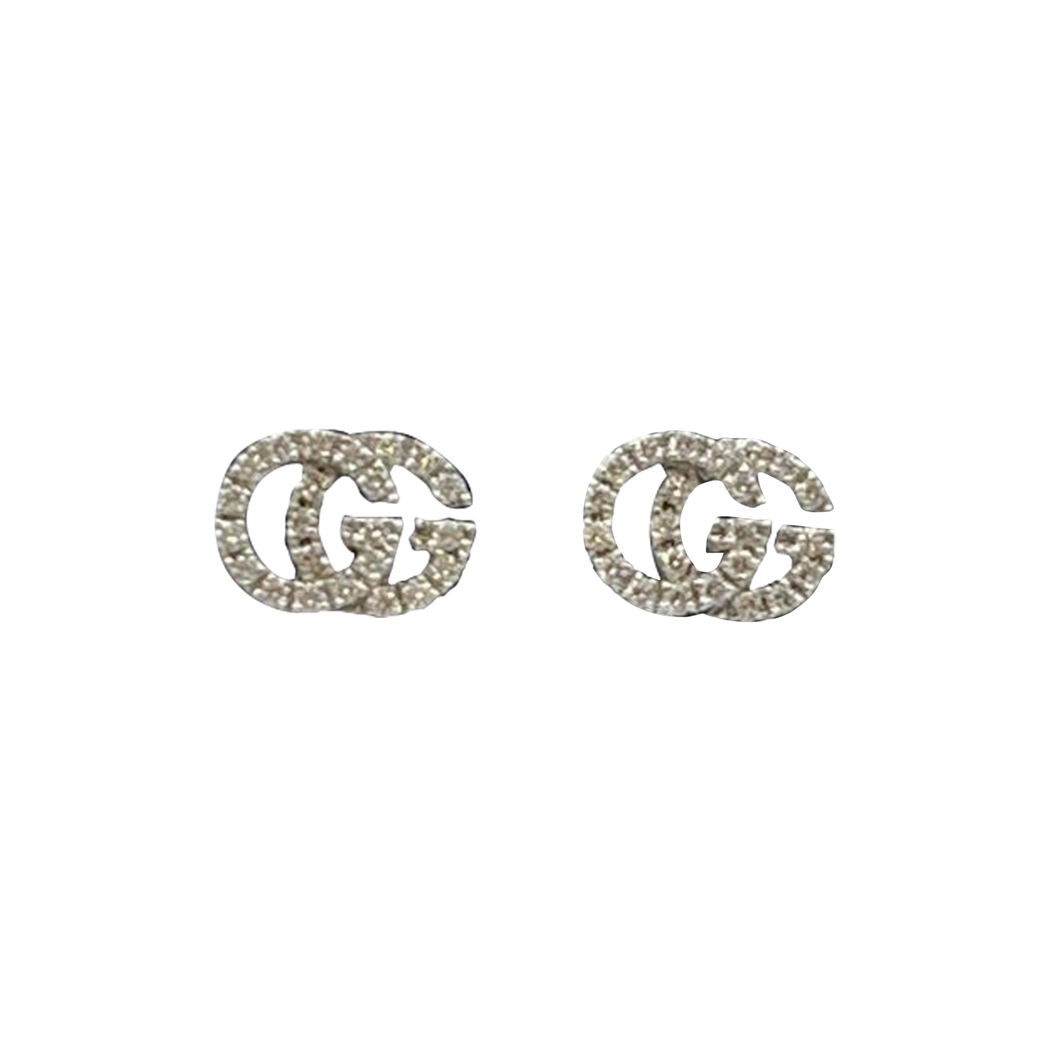 Orecchni Gucci Running G in oro bianco 18 kt. e diamanti in vendita