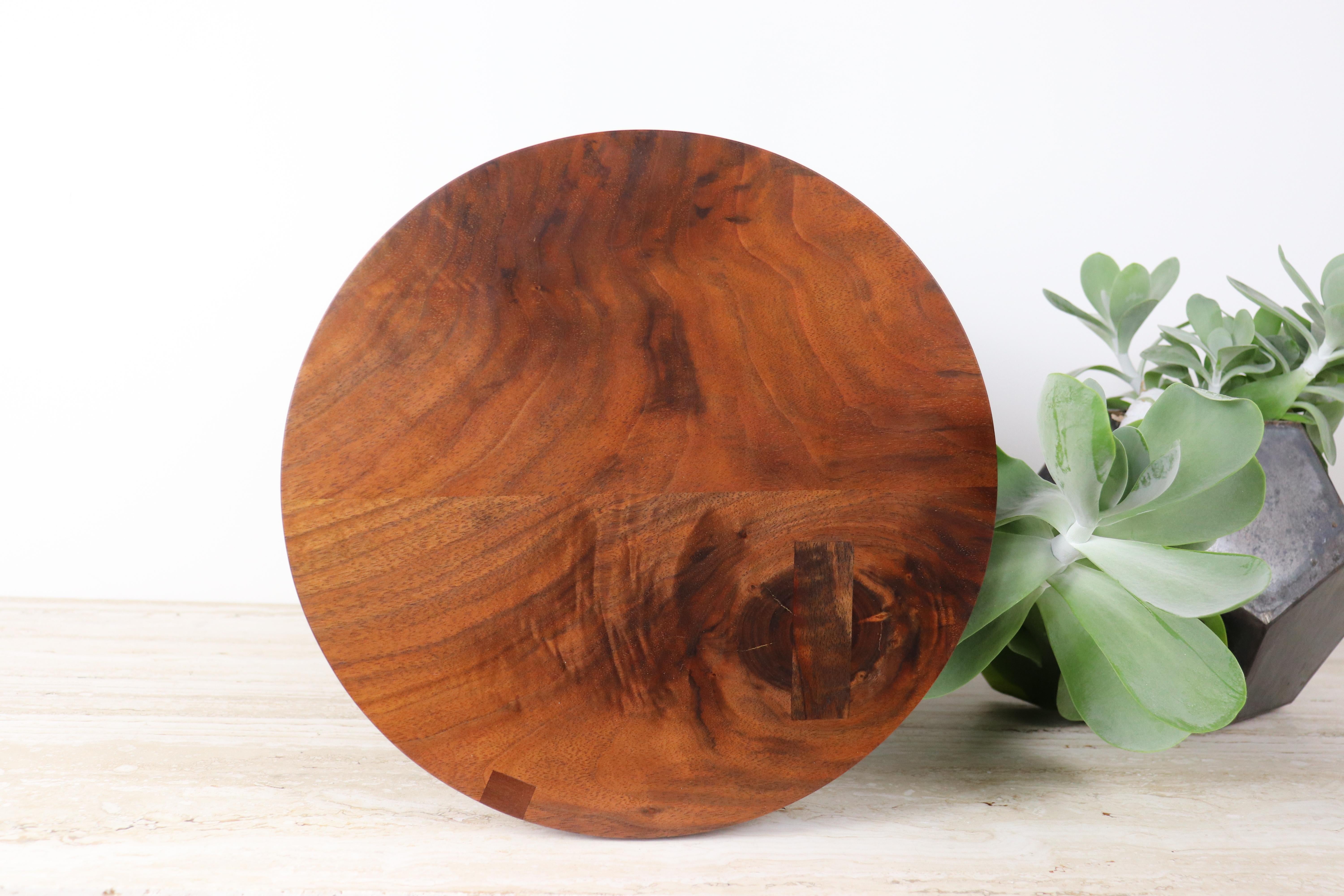 Solid wood stool / side table in stunning hand oiled Oregon back walnut with exquisite Dutchman details to infill natural voids in the wood. With a clean and minimal design, these stools are handmade in Portland, Oregon with mortise and Tenon