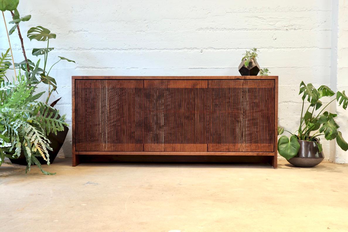 Solid Oregon Black Walnut credenza / sideboard with slatted screen doors from the workshop of Material Architecture in Portland, Oregon. Doors are grain matched to celebrate the beauty of figured walnut. With a solid wood back panel and cord