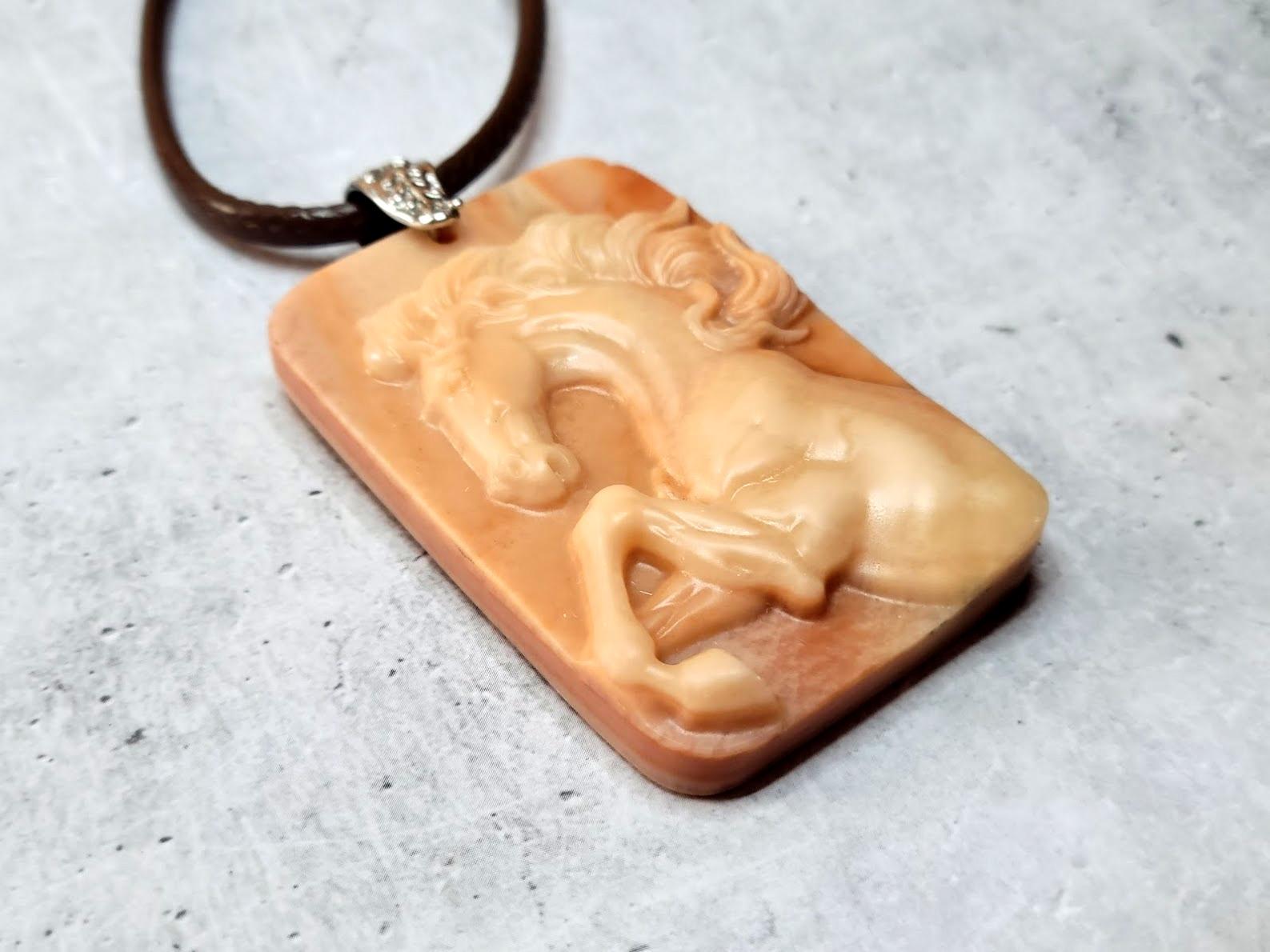 Mixed Cut Oregon Jasper Hand-Carved Horse Cameo Pendant For Sale