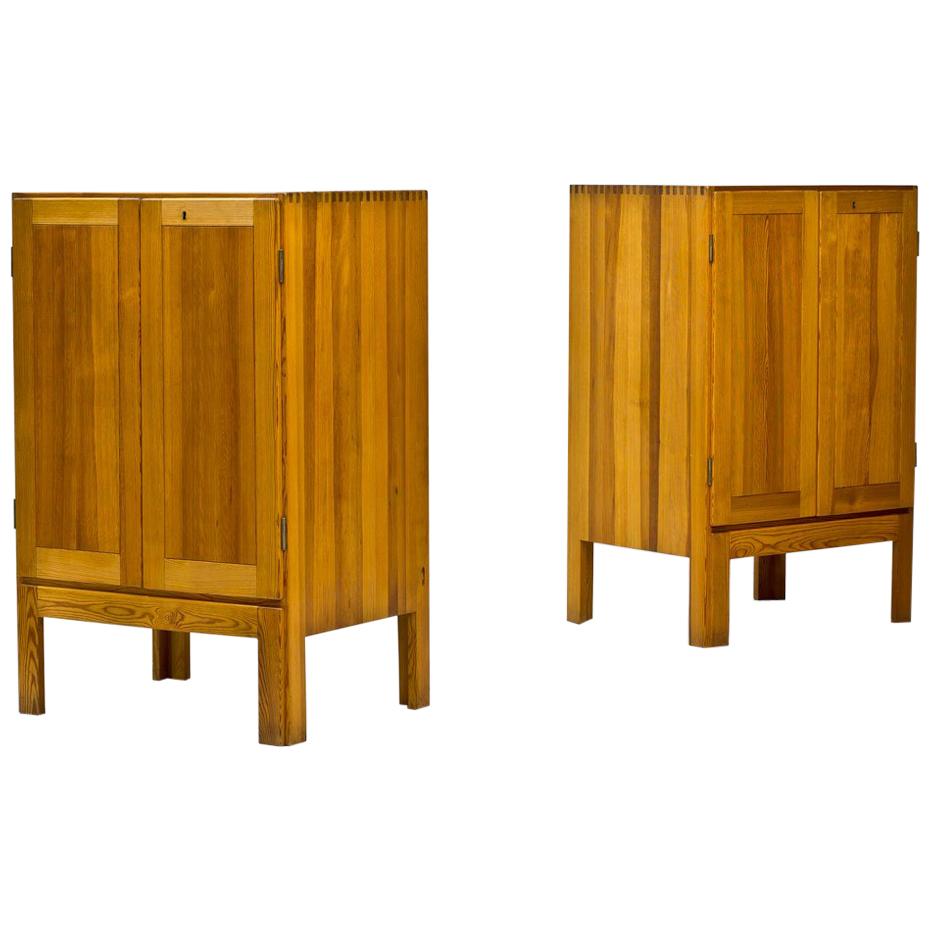 Rare pair of cabinets designed by Børge Mogensen, manufactured by Karl Andersson & Söner in Sweden during the 1960s. Made from Oregon Pine. Inside with grey lacquered shelves and drawers.