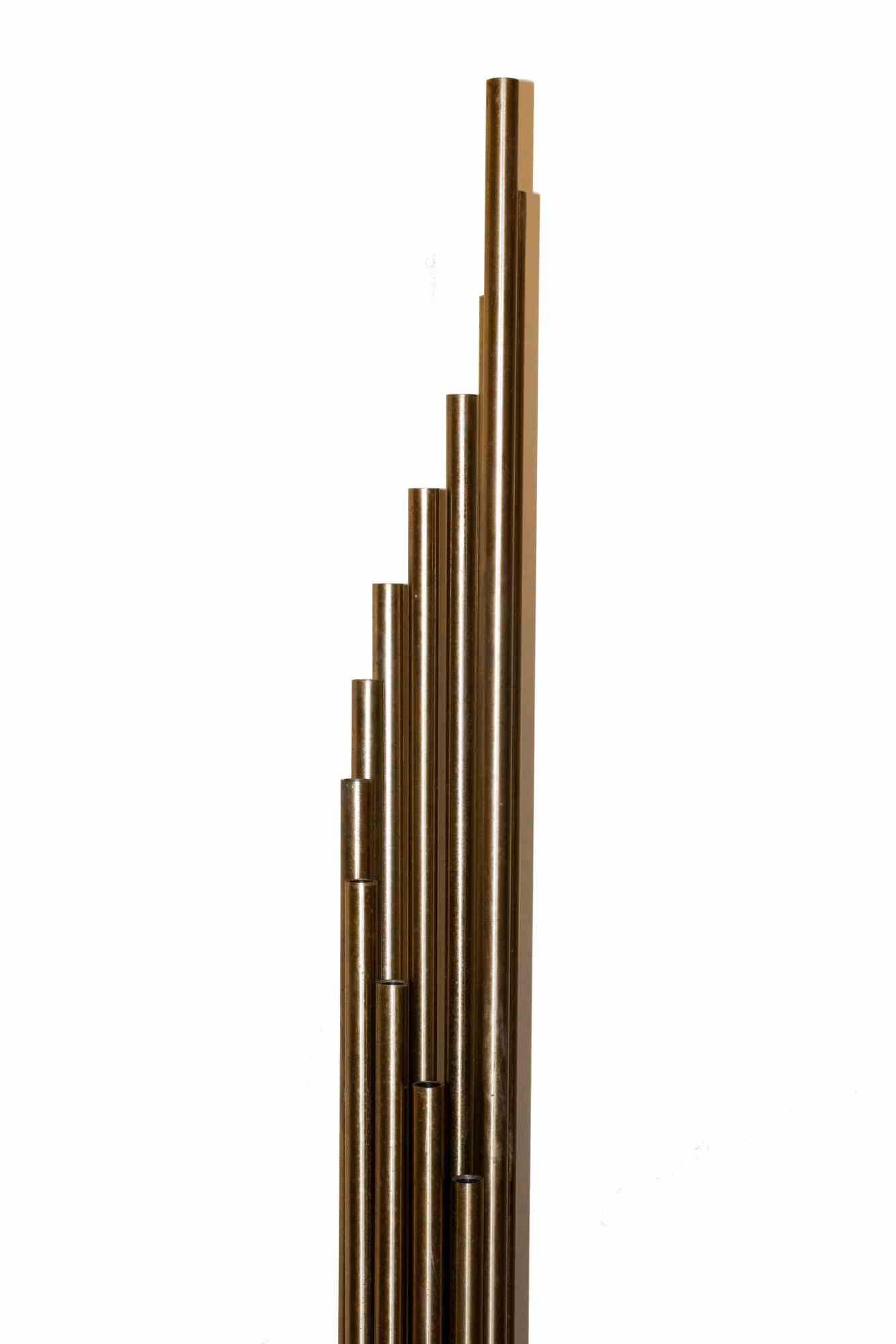 Organ lamp is an original contemporary Artwork realized in Italy in the 1970s by Goffredo Reggiani. 

Brass.

Made in Italy.

Created for Mobili nella Valle.

Total dimensions: 163 cm x 20 cm x 20 cm.

Perfect conditions.

Rare organ