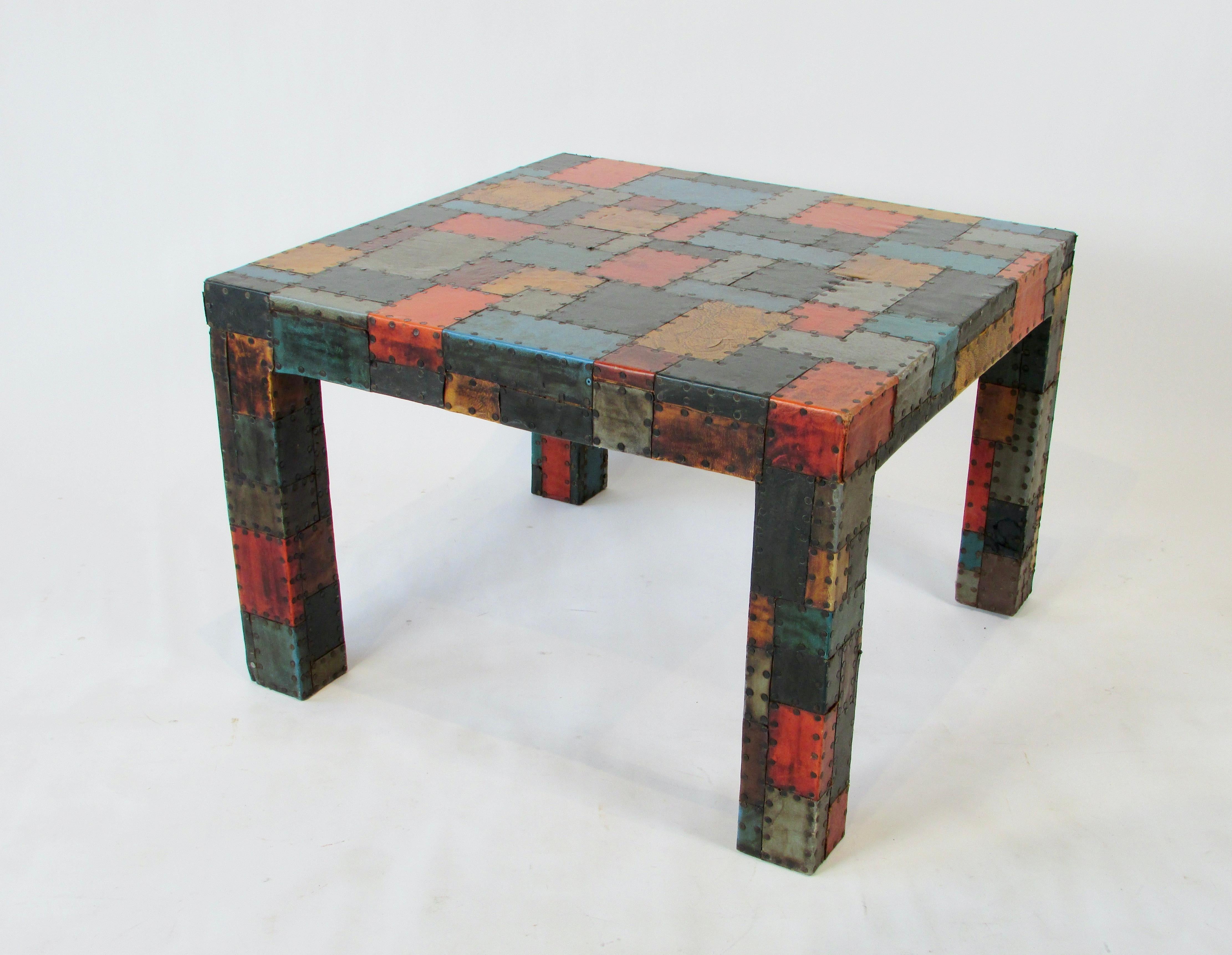 American Organic 1960s Folk Art Table with Hammered Nail Multi Color Leather Patchwork For Sale