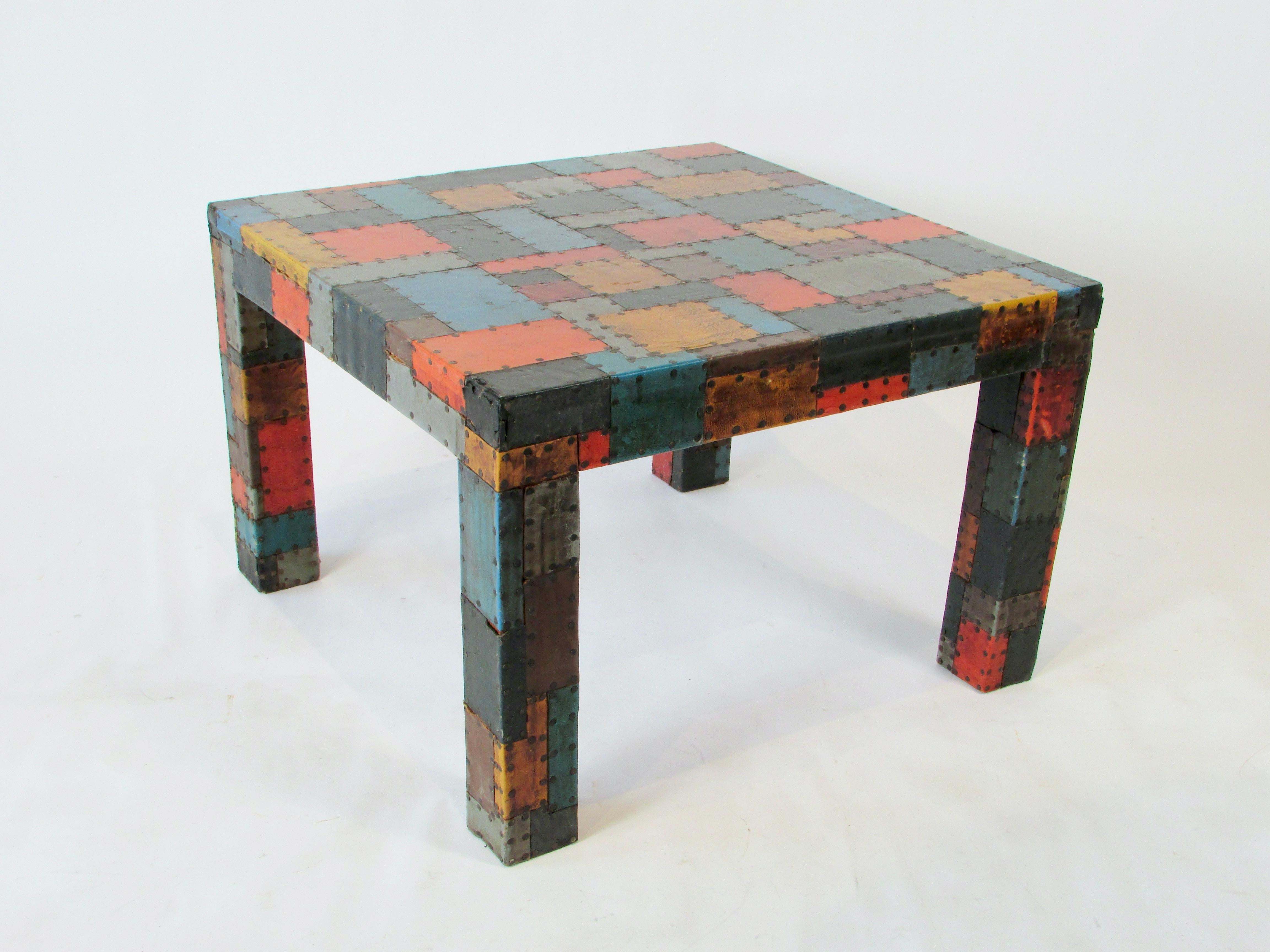 20th Century Organic 1960s Folk Art Table with Hammered Nail Multi Color Leather Patchwork For Sale