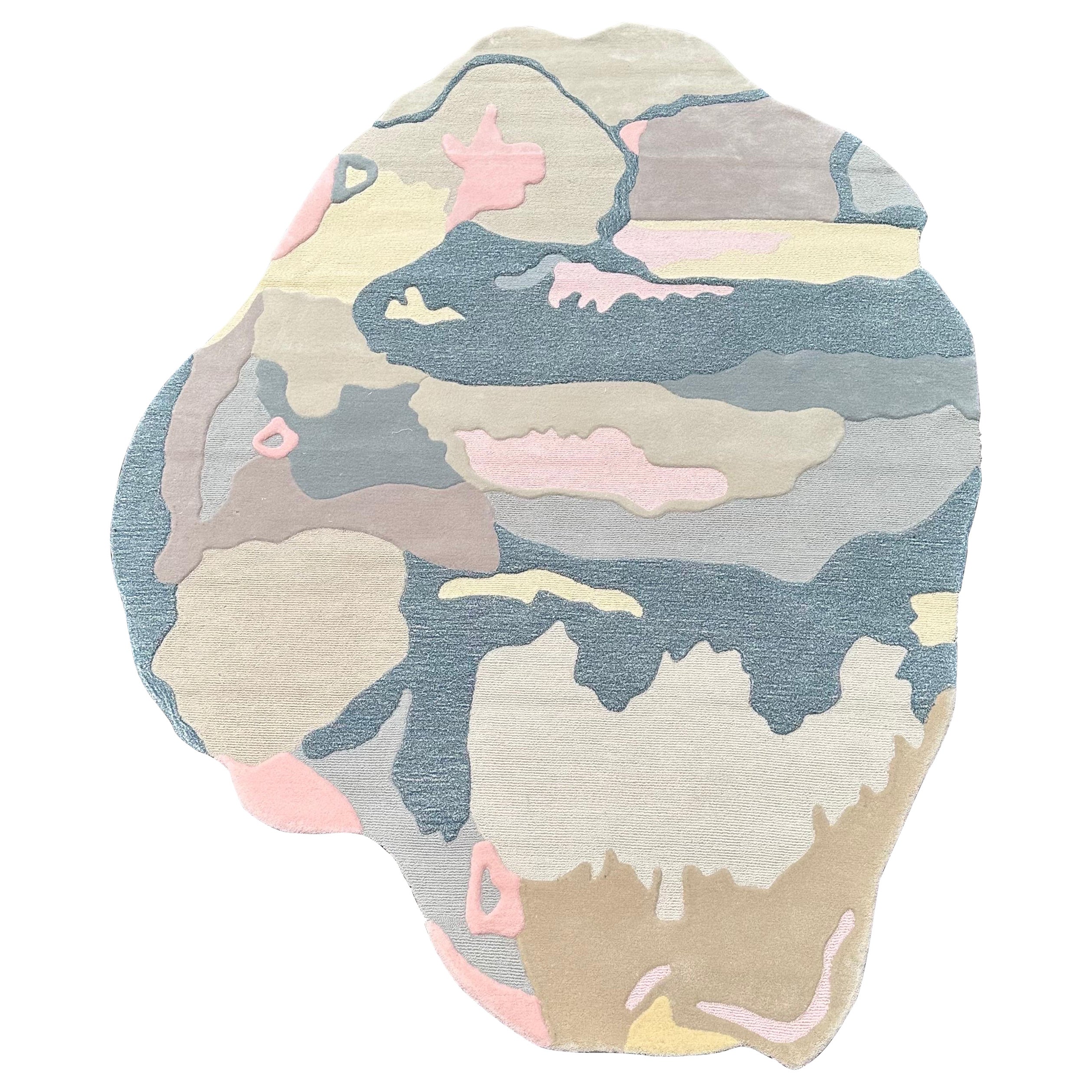 Alfombra orgánica abstracta en tonos azul pastel, beige y rosa