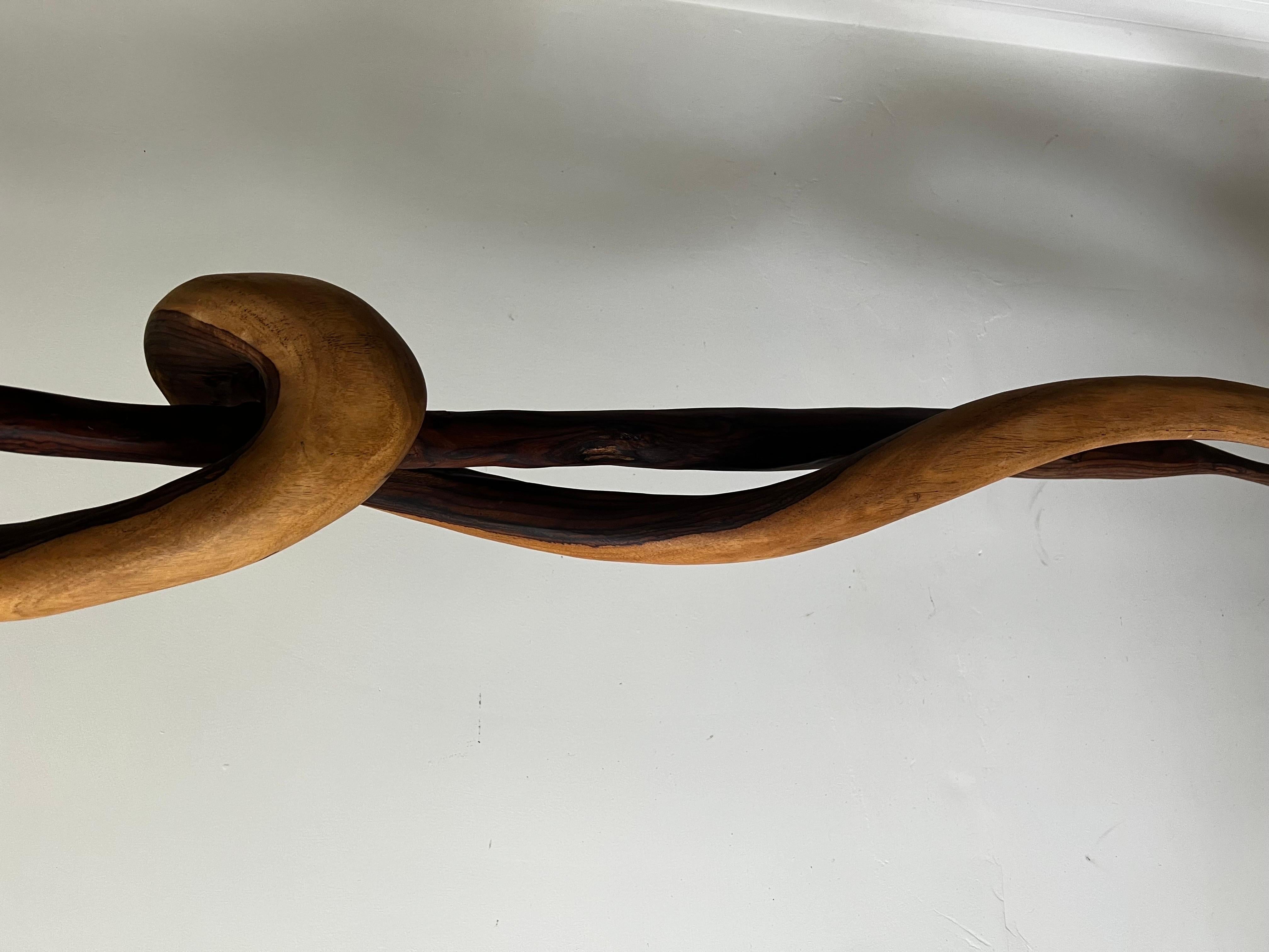 Minimalist Contemporary Sculpture in the style of Andrianna Shamaris.  Over 6 ft 2in in height.  
Black iron base 12 x 9.  
Very striking curves and detail in the smooth wood.  See images.  