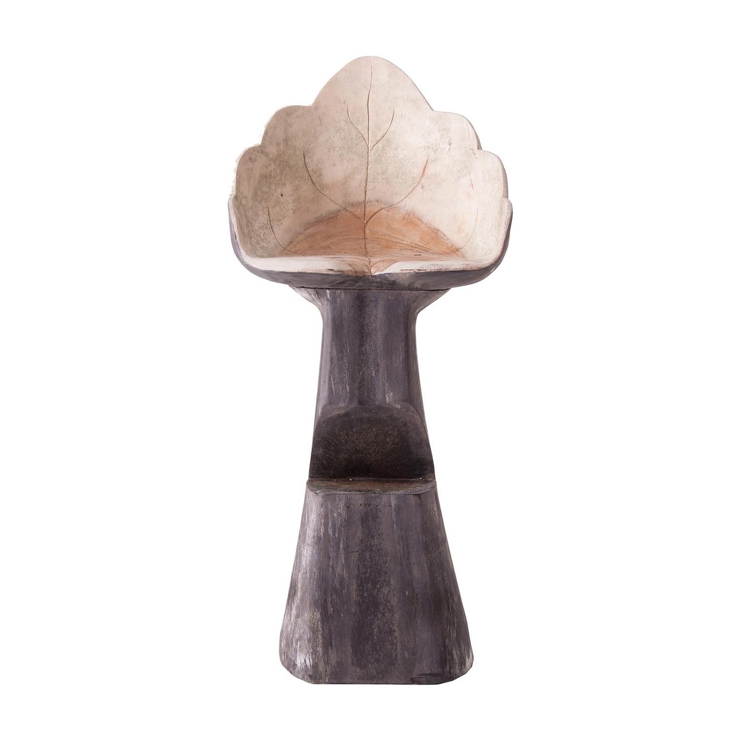 Organic style solid wood bar stool leaf shaped.