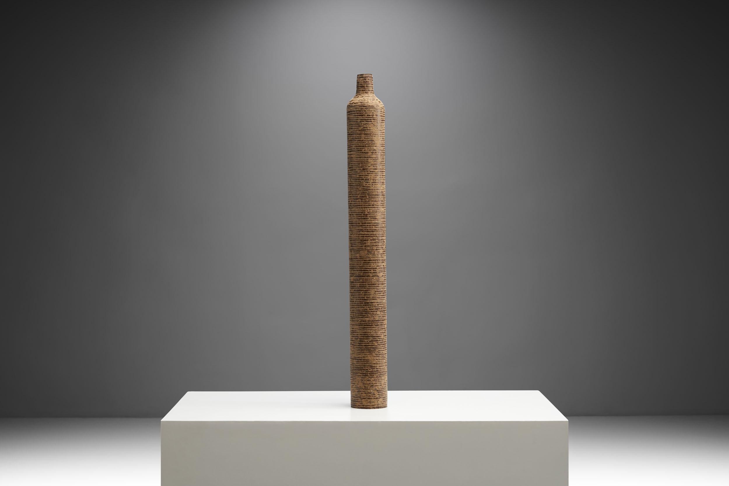This Large ribbed  “Anfora” vase by contemporary Brazilian artist Domingos Tótora is a prime example of the artist’s ars poetica: “I’m a mix of artist, designer, and craftsman.” Additionally, the environmentally conscious artist creates his