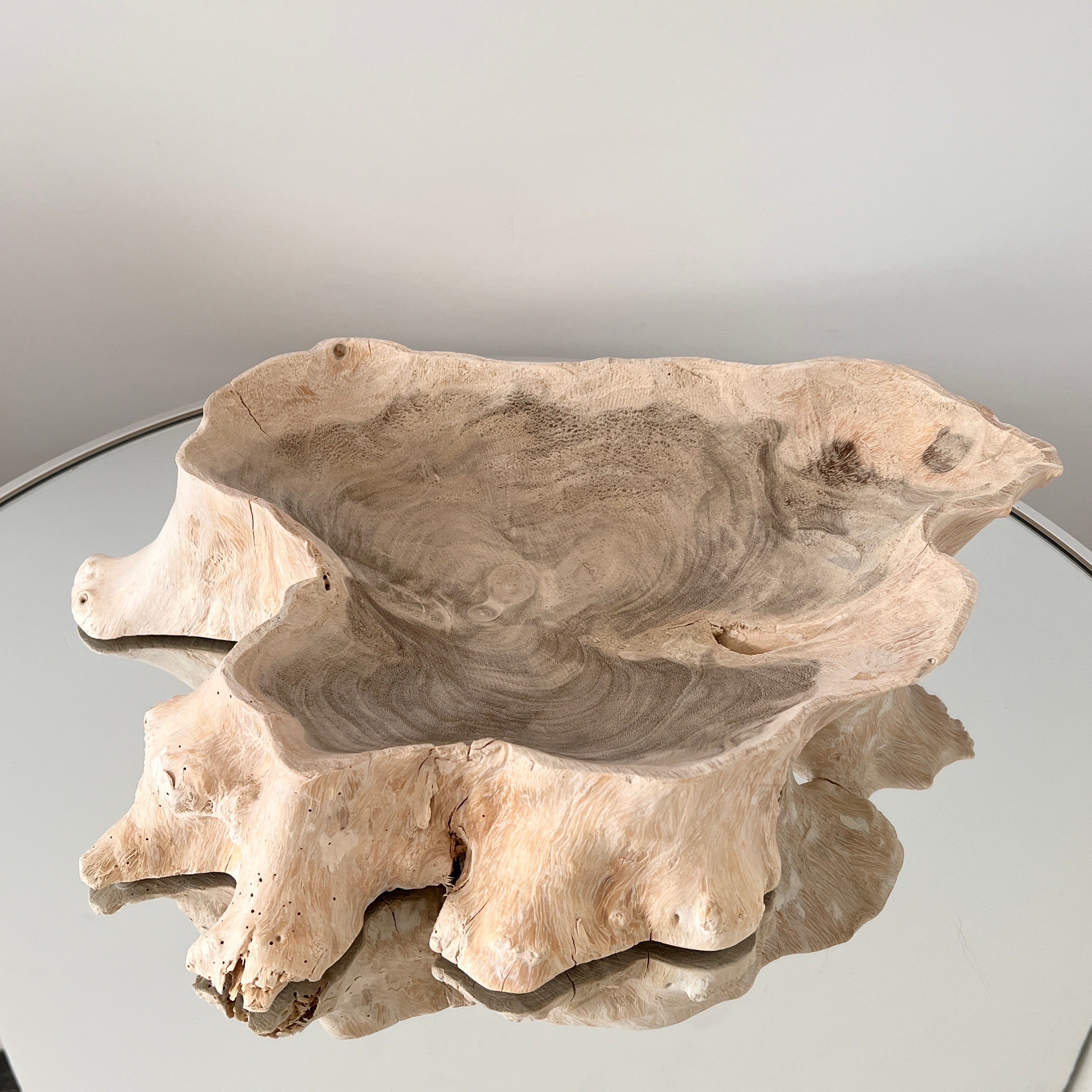 Organic Modern teak wood bowl with live edge. Hand cut by Balinese artisans, the bowls are made from reclaimed teak roots and feature a bleached white washed finish. Each bowl is unique due to the organic nature of the root, transforming this