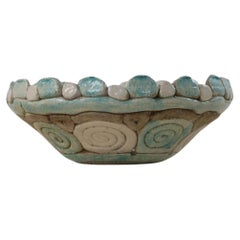 Vintage Organic bowl. Raw form with a natural effect and turquoise-white color from 1970